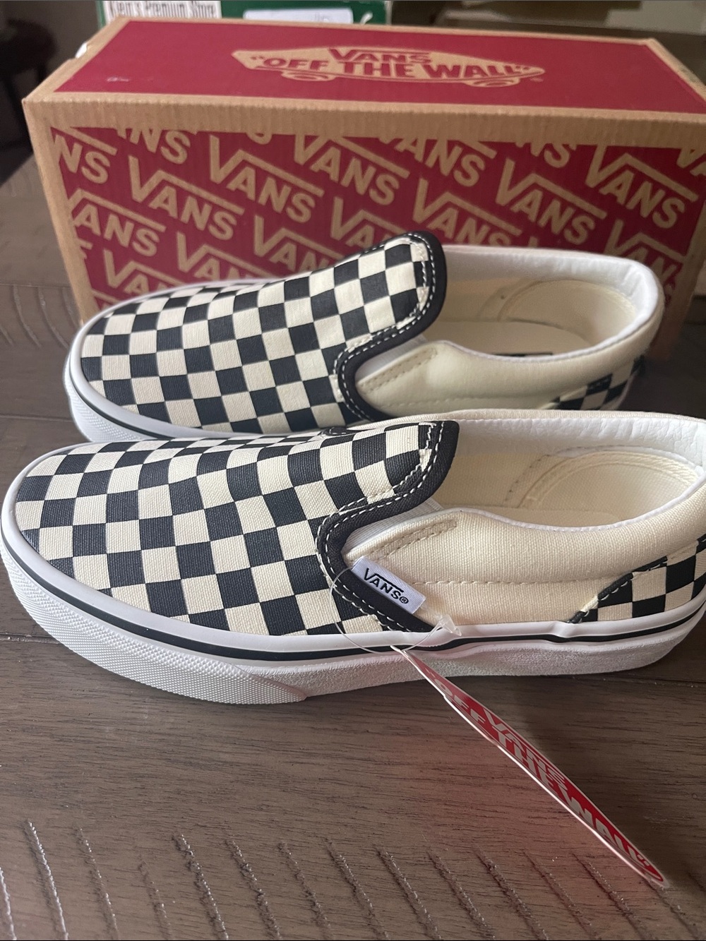 Vans Kids Checkerboard Slip-On Sneakers in Black and White Size 2